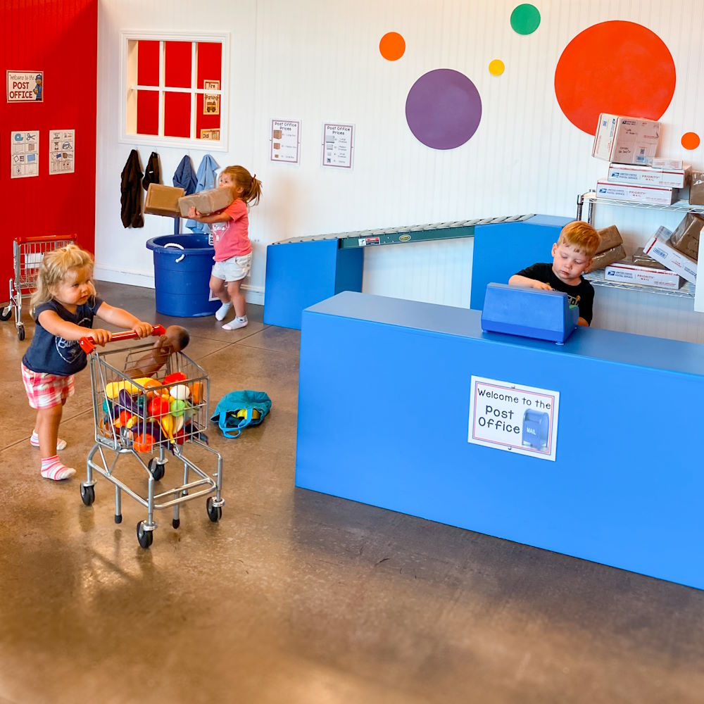 Kids Wonder kids playing in post office